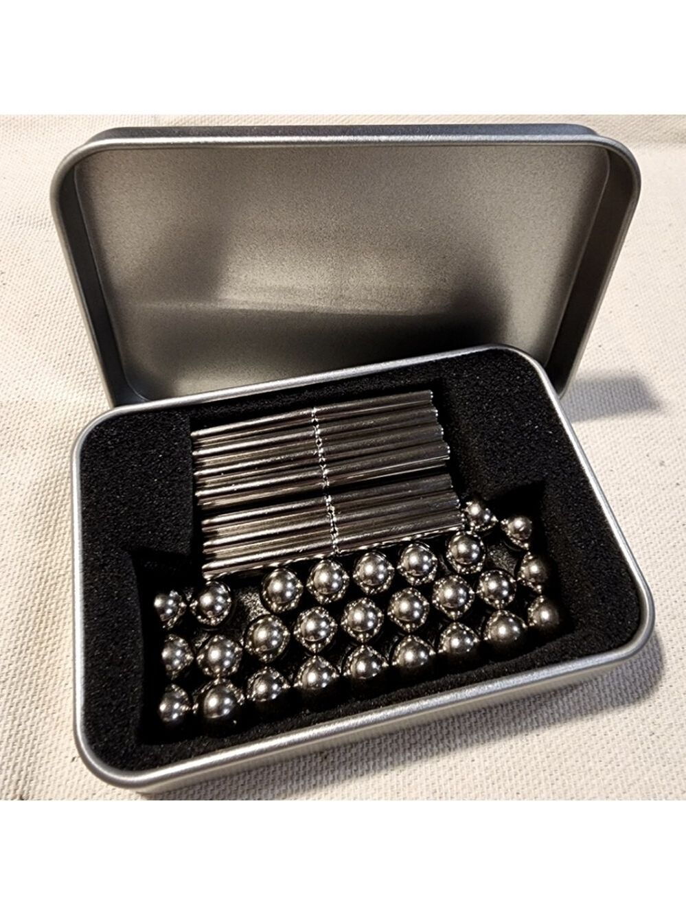 Magnetic rods with balls